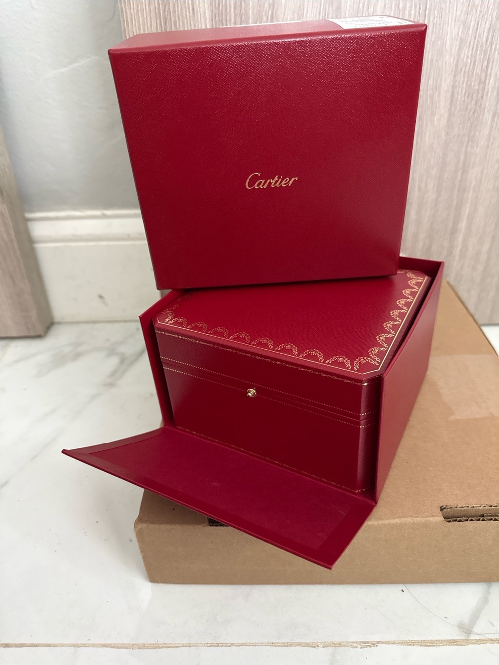 Cartier Red Jewelry Box with Gold Accents
